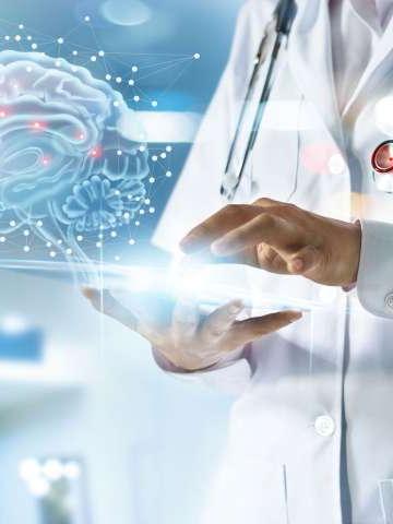 Doctor checking brain testing result with computer interface, innovative technology in science and medicine concept